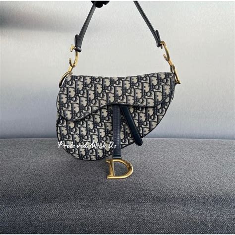 dior saddle bag pre loved|Dior saddle bag recall.